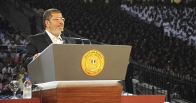 Egypt's President Mohamed Mursi speaks to the nation at Cairo stadium
