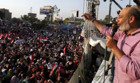 Islamic propagandist Safwat Hegazy delivers a speech to supporters of deposed Egyptian President Mohamed Mursi during a protest in Cairo
