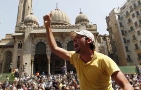 Supporters of ousted President Mursi shout slogans during protest outside Al-Fath Mosque in Ramsis square in Cairo